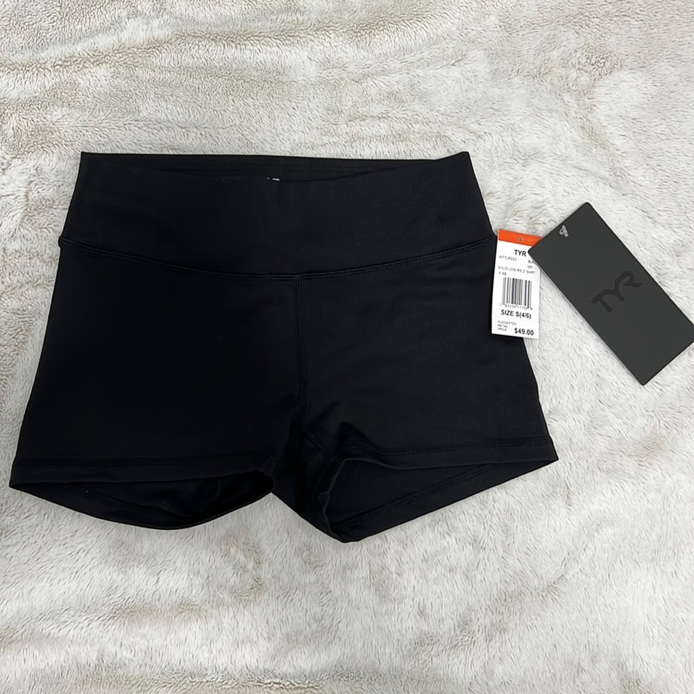 NWT TYR black solid low rise 2” shorts.